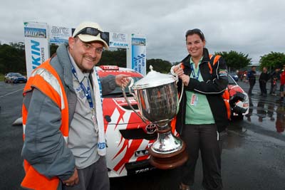 16-November-2008;ARC;Australia;Australian-Rally-Championship;Coffs-Coast;Coffs-Harbour;Joel-Strickland;NSW;New-South-Wales;Sarah-Strickland;atmosphere;auto;celebration;motorsport;photographer;podium;racing;trophy;wide-angle