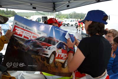 16-November-2008;ARC;Australia;Australian-Rally-Championship;Coffs-Coast;Coffs-Harbour;Coral-Taylor;NSW;New-South-Wales;auto;autograph;children;fans;motorsport;racing;spectators;wide-angle