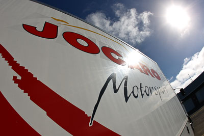 23-November-2008;Australia;Island-Magic;Jocaro-Motorsport;Melbourne;PIARC;Phillip-Island;VIC;Victoria;auto;brand;close‒up;detail;fisheye;logo;motorsport;racing;sky;sun;team;transporter