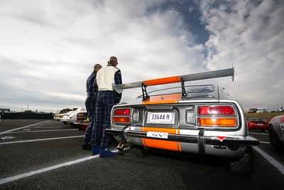 551;10-April-2009;1974-Datsun-260Z;33644H;Australia;Bathurst;FOSC;Festival-of-Sporting-Cars;Mt-Panorama;NSW;New-South-Wales;Vince-Harlor;atmosphere;auto;clouds;motorsport;paddock;racing;sky;wide-angle