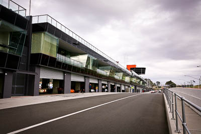 10-April-2009;Australia;Bathurst;FOSC;Festival-of-Sporting-Cars;Mt-Panorama;NSW;New-South-Wales;atmosphere;auto;building;clouds;motorsport;pit-lane;racing;sky;wide-angle