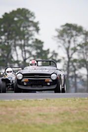 666;10-April-2009;1974-Triumph-TR6;Australia;Bathurst;FOSC;Festival-of-Sporting-Cars;Graeme-Rutledge;Historic-Sports-Cars;Mt-Panorama;NSW;New-South-Wales;auto;classic;motorsport;racing;super-telephoto;vintage