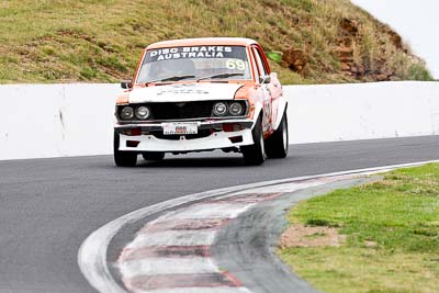 69;10-April-2009;1975-Mazda-Capella;Australia;Bathurst;FOSC;Festival-of-Sporting-Cars;Graeme-Shea;Improved-Production;Mt-Panorama;NSW;New-South-Wales;auto;motorsport;racing;super-telephoto