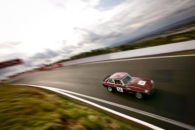 54;10-April-2009;1973-MGB-GT-V8;Australia;Bathurst;CH8732;FOSC;Festival-of-Sporting-Cars;Historic-Sports-Cars;Michael-Wood;Mt-Panorama;NSW;New-South-Wales;auto;classic;clouds;motion-blur;motorsport;racing;sky;vintage;wide-angle