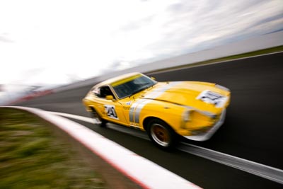 240;10-April-2009;1971-Datsun-240Z;Australia;Bathurst;FOSC;Festival-of-Sporting-Cars;Historic-Sports-Cars;Mt-Panorama;NSW;New-South-Wales;Russell-Stanford;auto;classic;clouds;motion-blur;motorsport;racing;sky;vintage;wide-angle