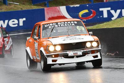 69;11-April-2009;1975-Mazda-Capella;Australia;Bathurst;FOSC;Festival-of-Sporting-Cars;Graeme-Shea;Improved-Production;Mt-Panorama;NSW;New-South-Wales;auto;motorsport;racing;super-telephoto