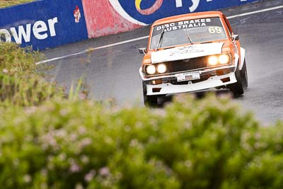 69;11-April-2009;1975-Mazda-Capella;Australia;Bathurst;FOSC;Festival-of-Sporting-Cars;Graeme-Shea;Improved-Production;Mt-Panorama;NSW;New-South-Wales;auto;motorsport;racing;super-telephoto