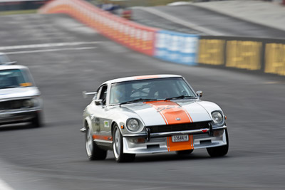 551;12-April-2009;1974-Datsun-260Z;33644H;Australia;Bathurst;FOSC;Festival-of-Sporting-Cars;Mt-Panorama;NSW;New-South-Wales;Regularity;Vince-Harlor;auto;motion-blur;motorsport;racing;super-telephoto