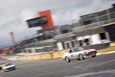 551;12-April-2009;1974-Datsun-260Z;33644H;Australia;Bathurst;FOSC;Festival-of-Sporting-Cars;Mt-Panorama;NSW;New-South-Wales;Regularity;Vince-Harlor;auto;motion-blur;motorsport;racing;telephoto