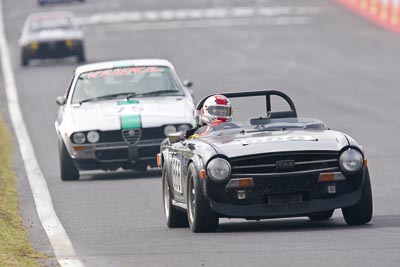 666;12-April-2009;1974-Triumph-TR6;Australia;Bathurst;FOSC;Festival-of-Sporting-Cars;Graeme-Rutledge;Historic-Sports-Cars;Mt-Panorama;NSW;New-South-Wales;auto;classic;motorsport;racing;super-telephoto;vintage