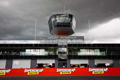 12-April-2009;Australia;Bathurst;FOSC;Festival-of-Sporting-Cars;Mt-Panorama;NSW;New-South-Wales;Topshot;atmosphere;auto;building;clouds;motion-blur;motorsport;pit-lane;racing;sky;tower;wide-angle