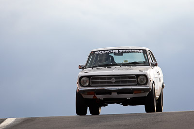 119;12-April-2009;1971-Datsun-1200-Coupe;Australia;Bathurst;FOSC;Festival-of-Sporting-Cars;Kurt-Woodward;Mt-Panorama;NSW;New-South-Wales;Regularity;auto;motorsport;racing;super-telephoto