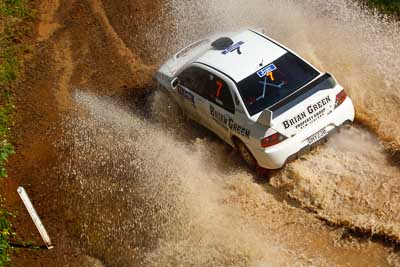 7;9-May-2009;APRC;Asia-Pacific-Rally-Championship;Australia;Brian-Green;Brian-Green-Motorsport;Evo-9;Fleur-Pedersen;IROQ;Imbil;International-Rally-Of-Queensland;Mitsubishi-Lancer;Mitsubishi-Lancer-Evolution-IX;QLD;Queensland;Rally-Queensland;Sunshine-Coast;auto;motorsport;racing;special-stage;telephoto;water-splash