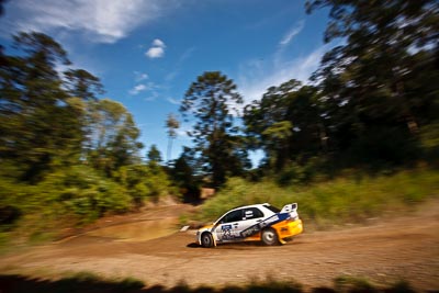 23;9-May-2009;ARC;Australia;Australian-Rally-Championship;David-Hills;Evo-9;IROQ;Imbil;International-Rally-Of-Queensland;Mitsubishi-Lancer;Mitsubishi-Lancer-Evolution-IX;QLD;Queensland;Rally-Queensland;Sunshine-Coast;Toni-Feaver;auto;clouds;motion-blur;motorsport;racing;sky;special-stage;speed;view;water-splash;wide-angle