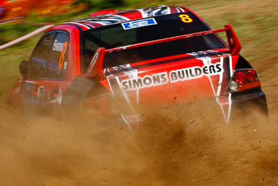 8;9-May-2009;APRC;Asia-Pacific-Rally-Championship;Australia;Evo-9;IROQ;Imbil;International-Rally-Of-Queensland;Mitsubishi-Lancer;Mitsubishi-Lancer-Evolution-IX;QLD;Queensland;Rally-Queensland;Simon-Evans;Sue-Evans;Sunshine-Coast;auto;dirt;dust;motion-blur;motorsport;racing;special-stage;telephoto