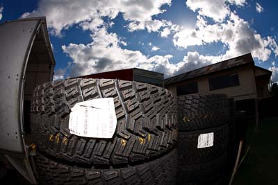 9-May-2009;APRC;Asia-Pacific-Rally-Championship;Australia;IROQ;Imbil;Imbil-Showgrounds;International-Rally-Of-Queensland;QLD;Queensland;Rally-Queensland;Sunshine-Coast;auto;clouds;detail;fisheye;motorsport;racing;service-centre;service-park;showgrounds;sky;sun;tyres