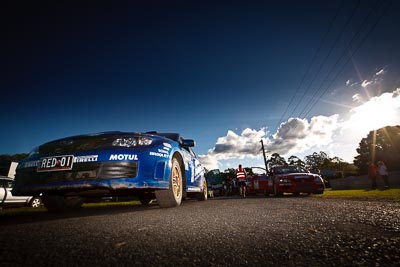 1;2;9-May-2009;APRC;Asia-Pacific-Rally-Championship;Australia;Ben-Atkinson;Cody-Crocker;Evo-9;IROQ;Imbil;Imbil-Showgrounds;International-Rally-Of-Queensland;Katsu-Taguchi;MRF-Tyres;Mark-Stacey;Mitsubishi-Lancer;Mitsubishi-Lancer-Evolution-IX;Motor-Image-Racing;QLD;Queensland;Rally-Queensland;Subaru-Impreza-WRX-STI;Sunshine-Coast;Team-MRF;afternoon;auto;clouds;low-angle;motorsport;racing;service;service-centre;service-park;showgrounds;sky;sun;tarmac;wide-angle