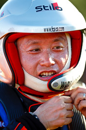 9-May-2009;APRC;Asia-Pacific-Rally-Championship;Australia;IROQ;Imbil;Imbil-Showgrounds;International-Rally-Of-Queensland;QLD;Queensland;Rally-Queensland;Rui-Wang;Sunshine-Coast;afternoon;auto;driver;helmet;motorsport;person;portrait;racing;service-centre;service-park;showgrounds;super-telephoto