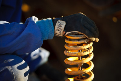 9-May-2009;APRC;Asia-Pacific-Rally-Championship;Australia;IROQ;Imbil;Imbil-Showgrounds;International-Rally-Of-Queensland;QLD;Queensland;Rally-Queensland;Sunshine-Coast;afternoon;auto;close‒up;detail;glove;hand;mechanic;motorsport;person;racing;service-centre;service-park;showgrounds;spring;super-telephoto