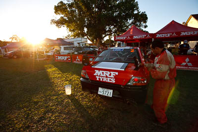 2;9-May-2009;APRC;Asia-Pacific-Rally-Championship;Australia;Evo-9;IROQ;Imbil;Imbil-Showgrounds;International-Rally-Of-Queensland;Katsu-Taguchi;MRF-Tyres;Mark-Stacey;Mitsubishi-Lancer;Mitsubishi-Lancer-Evolution-IX;QLD;Queensland;Rally-Queensland;Sunshine-Coast;Team-MRF;auto;crew;motorsport;persons;racing;service;service-centre;service-park;showgrounds;sky;sun;team;wide-angle