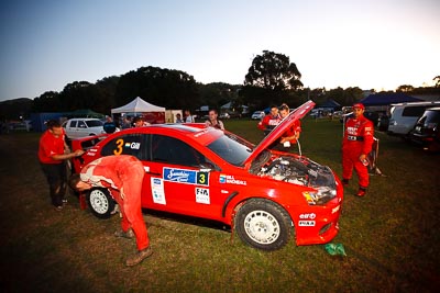 3;9-May-2009;APRC;Asia-Pacific-Rally-Championship;Australia;Evo-9;Gaurav-Gill;Glenn-Macneall;IROQ;Imbil;Imbil-Showgrounds;International-Rally-Of-Queensland;MRF-Tyres;Mitsubishi-Lancer;Mitsubishi-Lancer-Evolution-IX;QLD;Queensland;Rally-Queensland;Sunshine-Coast;Team-MRF;auto;motorsport;people;persons;racing;service;service-centre;service-park;showgrounds;sky;sun;twilight;wide-angle