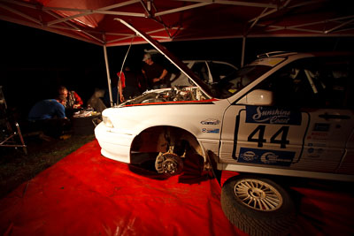 44;9-May-2009;Anthony-Jones;Australia;Colin-OBrien;IROQ;Imbil;Imbil-Showgrounds;International-Rally-Of-Queensland;Mitsubishi-Galant-VR4;QLD;QRC;Queensland;Queensland-Rally-Championship;Rally-Queensland;Sunshine-Coast;auto;crew;group;mechanics;motorsport;night;people;persons;racing;service;service-centre;service-park;showgrounds;team;tools;wide-angle;work