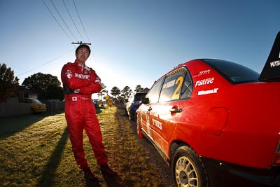 10-May-2009;APRC;Asia-Pacific-Rally-Championship;Australia;IROQ;Imbil;Imbil-Showgrounds;International-Rally-Of-Queensland;Katsu-Taguchi;QLD;Queensland;Rally-Queensland;Sunshine-Coast;auto;driver;fisheye;morning;motorsport;people;person;portrait;racing;service;service-park;showgrounds;sky;wide-angle