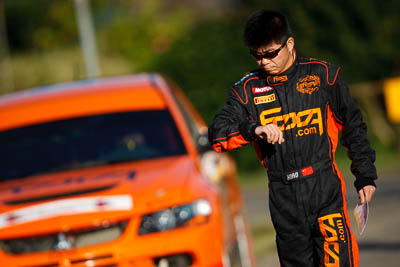 10-May-2009;APRC;Asia-Pacific-Rally-Championship;Australia;IROQ;Imbil;Imbil-Showgrounds;International-Rally-Of-Queensland;QLD;Queensland;Rally-Queensland;Song-Xiao;Sunshine-Coast;auto;co‒driver;morning;motorsport;person;portrait;racing;showgrounds;super-telephoto