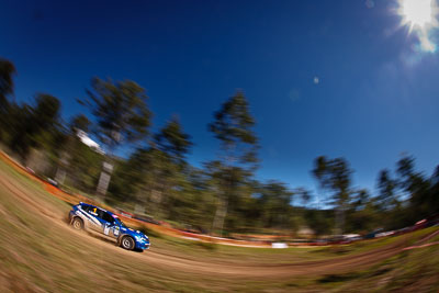 1;10-May-2009;APRC;Asia-Pacific-Rally-Championship;Australia;Ben-Atkinson;Cody-Crocker;IROQ;Imbil;Imbil-Showgrounds;International-Rally-Of-Queensland;Motor-Image-Racing;QLD;Queensland;Rally-Queensland;Sunshine-Coast;auto;fisheye;motion-blur;motorsport;racing;showgrounds;sky;special-stage;speed;sun;view