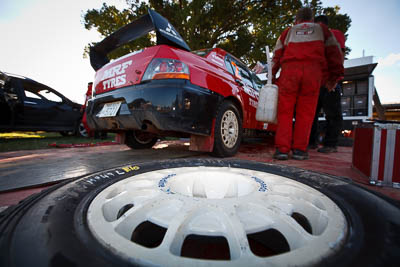 2;10-May-2009;APRC;Asia-Pacific-Rally-Championship;Australia;Evo-9;IROQ;Imbil;Imbil-Showgrounds;International-Rally-Of-Queensland;Katsu-Taguchi;MRF-Tyres;Mark-Stacey;Mitsubishi-Lancer;Mitsubishi-Lancer-Evolution-IX;QLD;Queensland;Rally-Queensland;Speedline-Corse;Sunshine-Coast;Team-MRF;auto;motion-blur;motorsport;people;persons;racing;service;service-park;showgrounds;tyre;wheel;wide-angle