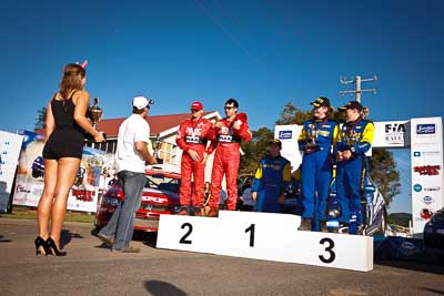 10-May-2009;APRC;Asia-Pacific-Rally-Championship;Australia;Ben-Atkinson;Cody-Crocker;Emma-Gilmour;IROQ;Imbil;Imbil-Showgrounds;International-Rally-Of-Queensland;Katsu-Taguchi;Mark-Stacey;QLD;Queensland;Rally-Queensland;Red-Devil-Girl;Rhianon-Smyth;Sunshine-Coast;auto;celebration;female;girl;model;motorsport;official-finish;people;persons;podium;promo-girl;racing;showgrounds;sky;wide-angle