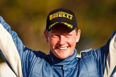 10-May-2009;ARC;Australia;Australian-Rally-Championship;Glen-Raymond;IROQ;Imbil;Imbil-Showgrounds;International-Rally-Of-Queensland;QLD;Queensland;Rally-Queensland;Sunshine-Coast;auto;celebration;driver;motorsport;official-finish;person;podium;portrait;racing;showgrounds;super-telephoto