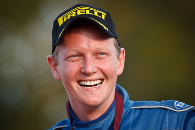 10-May-2009;ARC;Australia;Australian-Rally-Championship;Glen-Raymond;IROQ;Imbil;Imbil-Showgrounds;International-Rally-Of-Queensland;QLD;Queensland;Rally-Queensland;Sunshine-Coast;auto;celebration;driver;motorsport;official-finish;person;podium;portrait;racing;showgrounds;smile;super-telephoto