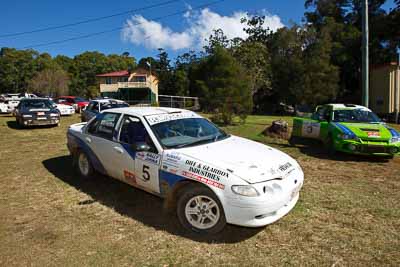 3;5;19-July-2009;Australia;Bob-McGowan;Ford-Falcon-XR8;Ian-Menzies;Jimna;Matthew-Bailey;Mike-Bailey;Mitsubishi-Lancer-Evolution-IV;QLD;QRC;Queensland;Queensland-Rally-Championship;Sunshine-Coast;auto;motorsport;racing;service-centre;service-park;wide-angle