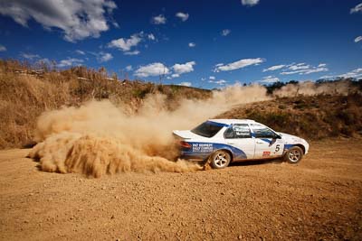 5;19-July-2009;Australia;Bob-McGowan;Ford-Falcon-XR8;Ian-Menzies;Jimna;QLD;QRC;Queensland;Queensland-Rally-Championship;Sunshine-Coast;auto;clouds;corner;dirt;dust;gravel;motorsport;racing;scenery;sky;special-stage;wide-angle