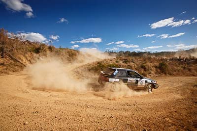 8;19-July-2009;Allan-Clunes;Australia;Gavin-Wieland;Jimna;Mazda-323-GTR;QLD;QRC;Queensland;Queensland-Rally-Championship;Sunshine-Coast;auto;clouds;corner;dirt;dust;gravel;motorsport;racing;scenery;sky;special-stage;wide-angle