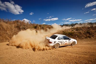 10;19-July-2009;Australia;Jimna;Lynnford-Stephenson;Mark-Neary;QLD;QRC;Queensland;Queensland-Rally-Championship;Subaru-Impreza-WRX;Sunshine-Coast;auto;clouds;corner;dirt;dust;gravel;motorsport;racing;scenery;sky;special-stage;wide-angle