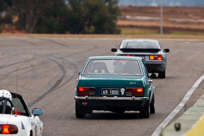 1;1974-Alfetta-Sedan;26-July-2009;AR1800;Australia;FOSC;Festival-of-Sporting-Cars;NSW;Narellan;New-South-Wales;Oran-Park-Raceway;Pat-Curda;Regularity;auto;motorsport;racing;super-telephoto