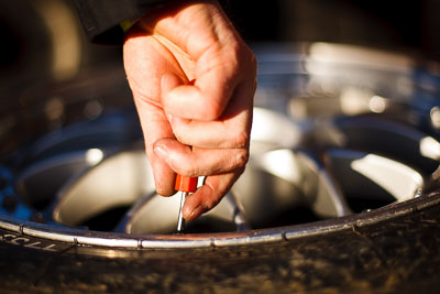 50mm;8-August-2009;Australia;Morgan-Park-Raceway;QLD;Queensland;Shannons-Nationals;Warwick;atmosphere;auto;close‒up;detail;hand;mechanic;motorsport;paddock;racing;tyre;wheel