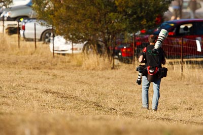 8-August-2009;Australia;Dirk-Klynsmith;Morgan-Park-Raceway;QLD;Queensland;Shannons-Nationals;Warwick;atmosphere;auto;camera;gear;grass;lens;motorsport;photographer;professional;racing;super-telephoto;walking