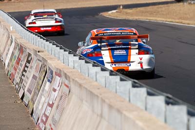 7;9-August-2009;Australia;Morgan-Park-Raceway;Porsche-996-GT3-Cup;Porsche-GT3-Cup;QLD;Queensland;Raymond-Angus;Shannons-Nationals;Warwick;armco;auto;barrier;motorsport;racing;super-telephoto