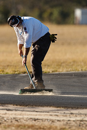 9-August-2009;Australia;Matt-Pegg;Morgan-Park-Raceway;QLD;Queensland;Shannons-Nationals;Warwick;atmosphere;auto;broom;marshal;motorsport;official;racing;super-telephoto;sweep