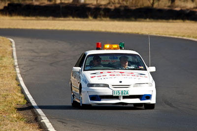 115BZA;30-August-2009;Australia;Holden-Commodore;Morgan-Park-Raceway;QLD;Queensland;Queensland-State-Championship;Warwick;atmosphere;auto;motorsport;officials;racing;safety-car;super-telephoto
