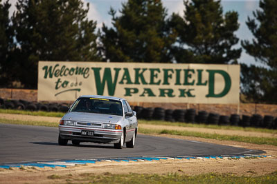 301;1990-Ford-Laser;30-October-2009;Australia;FOSC;Festival-of-Sporting-Cars;NSW;New-South-Wales;Regularity;Wakefield-Park;Whitby;auto;motorsport;racing;super-telephoto