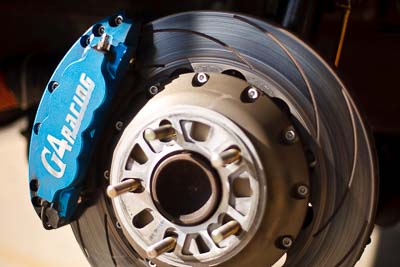 21-March-2010;50mm;Australia;Morgan-Park-Raceway;QLD;Queensland;Warwick;atmosphere;auto;brake-caliper;brake-disc;brand;close‒up;detail;logo;motorsport;racing