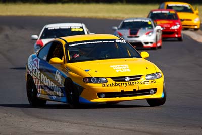 691;21-March-2010;Australia;Holden-Monaro-CV8;Morgan-Park-Raceway;Production-Cars;QLD;Queensland;Tony-Grant;Warwick;auto;motorsport;racing;super-telephoto