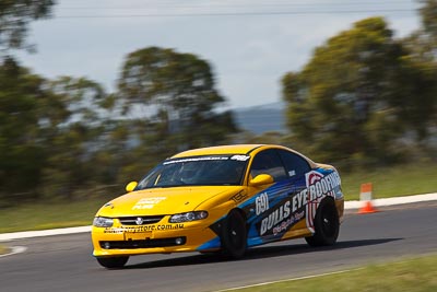 691;21-March-2010;Australia;Holden-Monaro-CV8;Morgan-Park-Raceway;Production-Cars;QLD;Queensland;Tony-Grant;Warwick;auto;motorsport;racing;super-telephoto