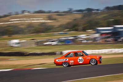 38;1969-Mazda-R100;2-April-2010;Australia;Bathurst;FOSC;Festival-of-Sporting-Cars;Improved-Production;James-Sutton;Mt-Panorama;NSW;New-South-Wales;auto;motion-blur;motorsport;racing;telephoto