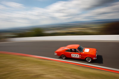 777;1969-Holden-Monaro-GTS-350;3-April-2010;Australia;Bathurst;FOSC;Festival-of-Sporting-Cars;Fred-Brain;Historic-Touring-Cars;Mt-Panorama;NSW;New-South-Wales;XWR227;auto;classic;clouds;motion-blur;motorsport;movement;racing;sky;speed;vintage;wide-angle