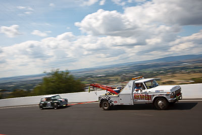 3-April-2010;Australia;Bathurst;FOSC;Festival-of-Sporting-Cars;Mt-Panorama;NSW;New-South-Wales;auto;clouds;motion-blur;motorsport;movement;officials;racing;sky;speed;tow-truck;wide-angle